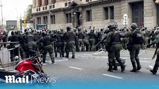 Argentine protests Clashes outside Congress after veto of pension rise [upl. by Ahsienel487]