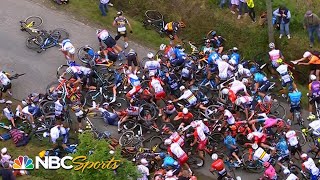 Fan with sign causes huge pileup in Stage 1 of the Tour de France  Cycling on NBCSports [upl. by Odella]