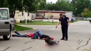 See officer pull Taser on entire family [upl. by Alyosha]