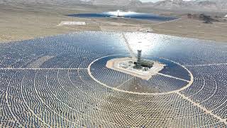 Aerial of a large solar thermal plant in the desert [upl. by Friedland]