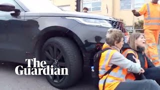 Footage shows moment Insulate Britain protester was pushed by wheels of car [upl. by Hattie]