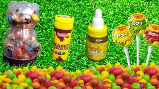 candy rainbow lollipopsrelaxingcandy chocolate peanutsatisfying video of fruity beans candy ASMR [upl. by Ahdar]