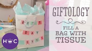 How to Stuff a Gift Bag with Tissue  Giftology [upl. by Orlantha]