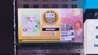 NYC Big Book Award showcasing awardwinning authors in NYC Times Square Billboard 3 [upl. by Suoicerp]