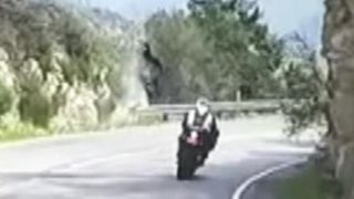 Motorcycle flips over cliff in scary crash caught on tape [upl. by Haianeb]