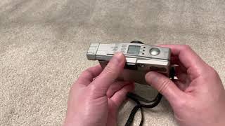 Demonstrating loading an APS film into the Canon IXUS Z70 [upl. by Buffo960]