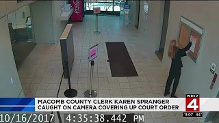 Macomb County Clerk Karen Spranger caught on camera covering up court order [upl. by Ogdon]