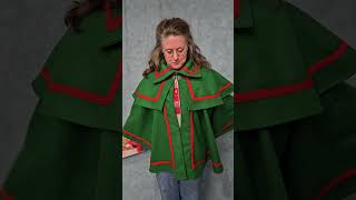 How to Wear a Caroling Cape and hold sheet music [upl. by Rexferd]