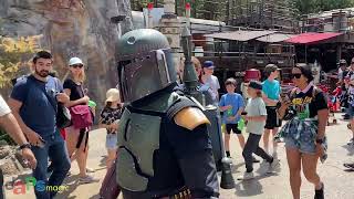 Boba Fett Walking Through Black Spire Outpost at Star Wars Galaxys Edge at Disneyland [upl. by Erline996]