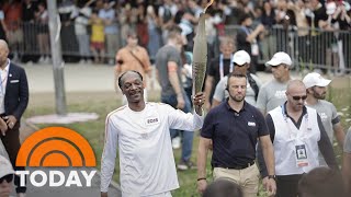 Watch Snoop Dogg carry the Olympic torch into Paris [upl. by Ecinaej219]