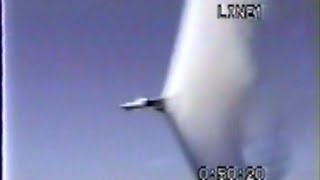 Jet Breaking Sound Barrier over Water F14 Tomcat Fighter Plane in Supersonic Low Flyby US Navy Ship [upl. by Lleoj]