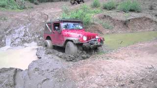 Jeep TJ Wrangler on 35s Bogged in the Mud  Messy [upl. by Draper737]