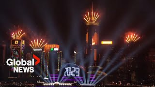 New Years 2023 Hong Kong hosts cinematic light show over Victoria Harbour [upl. by Neelyam]