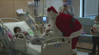 Santa Claus makes a surprise visit to a local Harrisburg hospital [upl. by Lebisor]