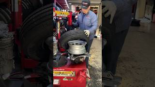 Installing a trailer tire tires [upl. by Kessel]