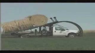 wiota critter loading and stacking round bales [upl. by Lowenstern]