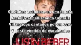 Justin Bieber christmas song Chestnuts Roasting On An Open Fire en español [upl. by Ennayk]