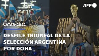 Desfile triunfal de la selección argentina por Doha  AFP [upl. by Fitton]