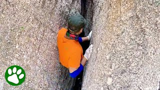 Brave man climbs down narrow ravine after hearing cries for help [upl. by Inoliel]