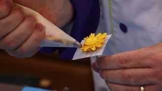 How to Make Buttercream Flowers and Borders with Petal and Leaf Tips  Global Sugar Art [upl. by Eixam]