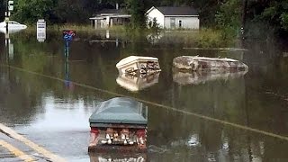 Eerie Coffins Seen Floating Through Flooded Louisiana Streets [upl. by Maples]