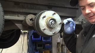 How to fit a trailer brake drum with taper roller bearings [upl. by Seyler]