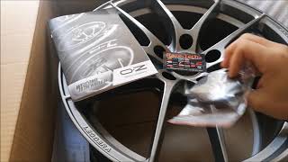 RaceTechit unpacking OZ Racing Leggera HLT 9x19 Grigio Corsa Bright [upl. by Ymmak]