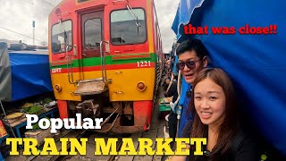 UNUSUAL TRAIN run through marketMaeklong Railway MarketTalad Rom Hub Must see in Thailand [upl. by Annaert]