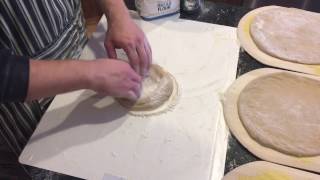 How to Stretch Pizza Dough [upl. by Elysee]