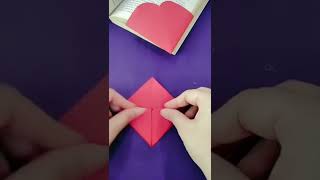 How to make origami heart bookmark  DIY heart shape paper bookmark instructions  shorts [upl. by Kcolttam479]