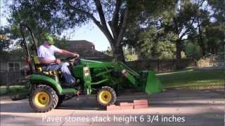 John Deere 1026R Front Axle Suspension [upl. by Alon176]