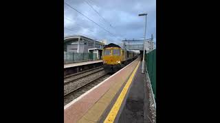 EWS Class 66 Blasts through Bristol Parkway Station giving us a tone britishtrains trainspotting [upl. by Asaert381]