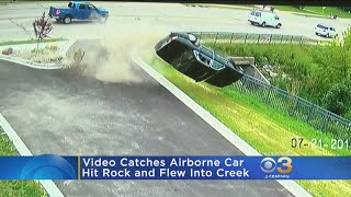 Video Captures Car Go Airborne Into A Creek [upl. by Gnal]