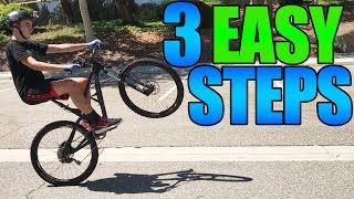 How to Wheelie a Mountain Bike  3 Easy Steps [upl. by Atsirk]