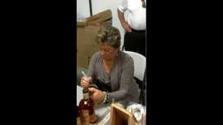 Deirdre Marie Capone signing Templeton Rye Whiskey bottles [upl. by Durkin]