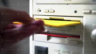 Inserting Diskette Into Retro Computer Timelapse floppy disk information technology data transfer [upl. by Ennirroc442]