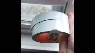 cheap quick fix drafty vinyl windows vinyl window draft fix white gorilla tape  not an advert [upl. by Mcmaster805]