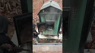 Cleaning out the wood boiler woodboiler woodstove homeheating [upl. by Lerak]