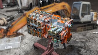 Excavator Rebuild valve control block disassembly  Hitachi EX1202 [upl. by Eltsryk536]