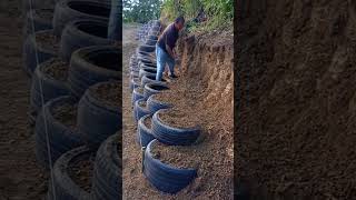 Slope protection building process with tires [upl. by Amyaj620]