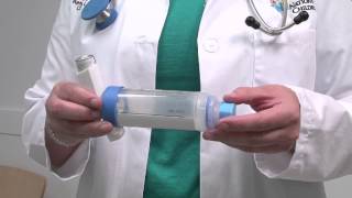 Asthma howto How to use an inhaler with a spacer and mouthpiece [upl. by Atibat]