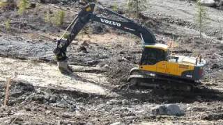 Volvo EC210CL Grading and Moving Clay [upl. by Ardnaid]