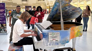 A random passerby plays the piano Oculus World Trade Center [upl. by Ahsienak]