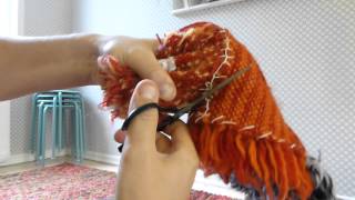 Cutting a flokati rug with scissors [upl. by Nnylyak]