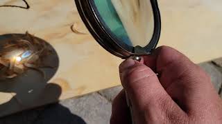 Starting a fire with a magnifying glass in under a minute [upl. by Attenra]