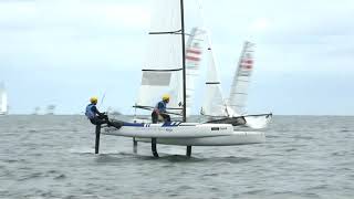 Nacra 17 Sailing  Setting the Spinnaker  Foiling First [upl. by Aicekat557]