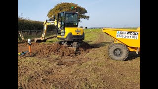 Loading a Thwaites Dumper with a Yanmar SV26 excavator digger [upl. by Laina]