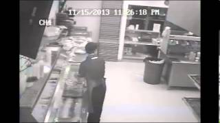 Surveillance video Dominos Pizza robbery [upl. by Anesor]