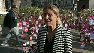 Campaigners for assisted dying fill Westminster with trees displaying dying sashes [upl. by Anit]