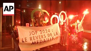 Protesters concerned about impact of Olympics on Paris rally in city [upl. by Eciruam]